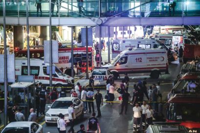 Police and medical relief workers at Ataturk airport after the attack on 28 June