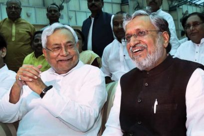 Nitish Kumar (left) and Deputy Chief Minister Sushil Kumar Modi after taking their oath on July 27
