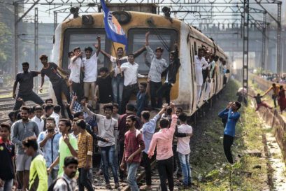 Dalit protestors block a Mumbai local train on January 4