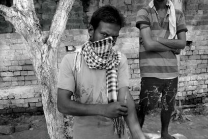 An addict in the back alleys of the Verka Chowk slum cluster, Amritsar