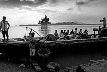A swollen Brahmaputra flows quietly even as Assam witnesses political unrest over illegal migration